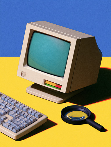 magnifying glass next to a computer representing WordPress SEO